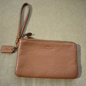 Like new embossed Coach Leather double zip camel colored wristlet